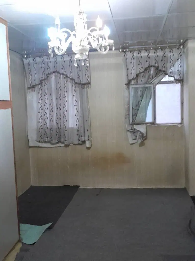 خانه راه جدا در خیابان ادیب (طالقانی)