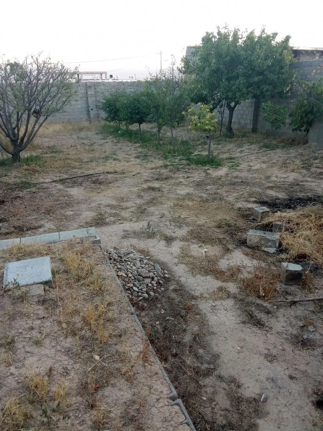 فروش زمین مسکونی با خانه نیمه ساز