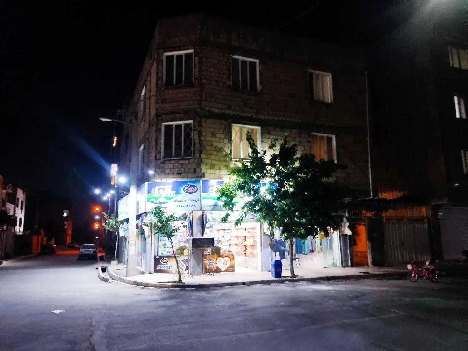 فروش آپارتمان تک واحدی و دو دهنه مغازه تجاری