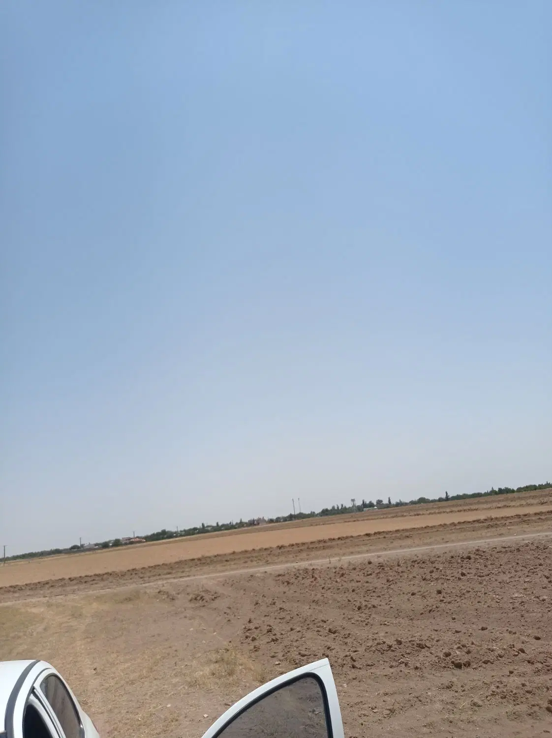 زمین کشاورزی به متراژ ۱۲هزار متر کنار جاده آ سفالت