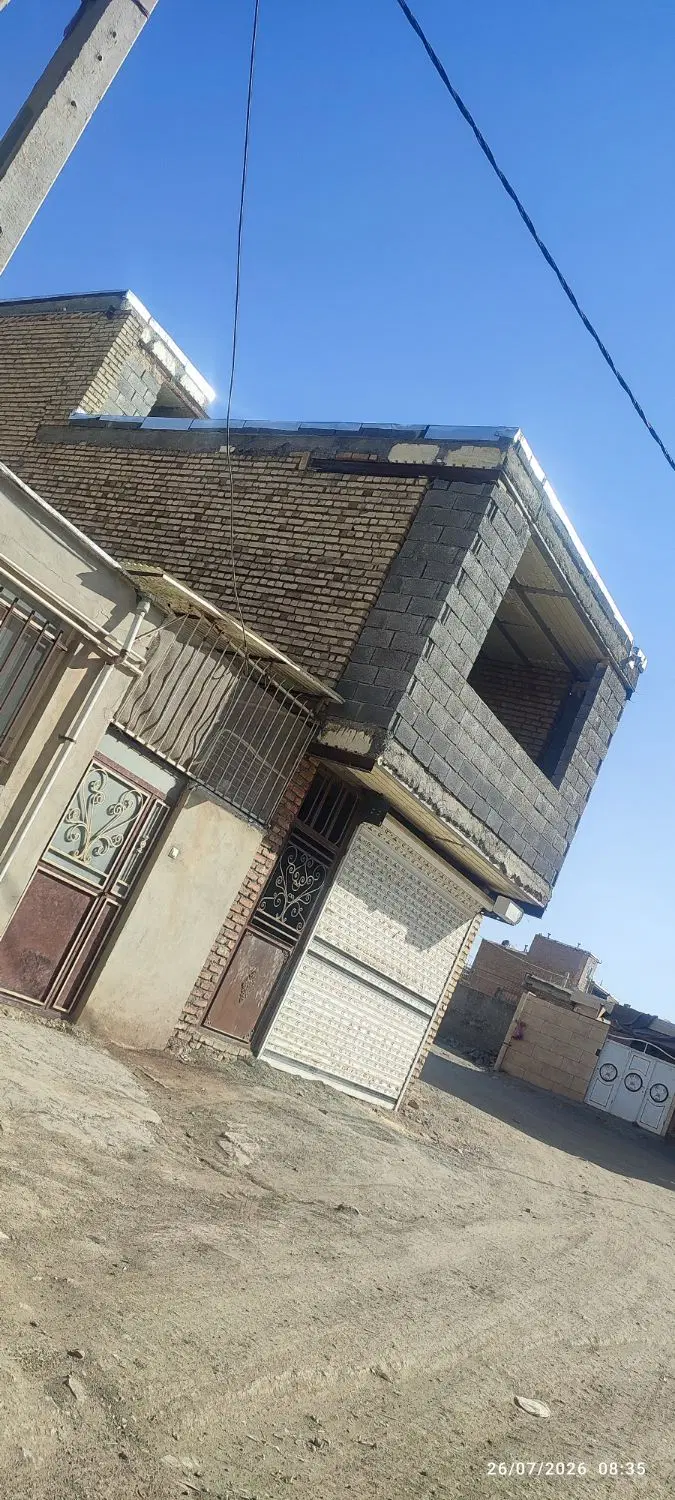 خانه ومغازه60متری  نیمه کاره روی کوچه ده متری
