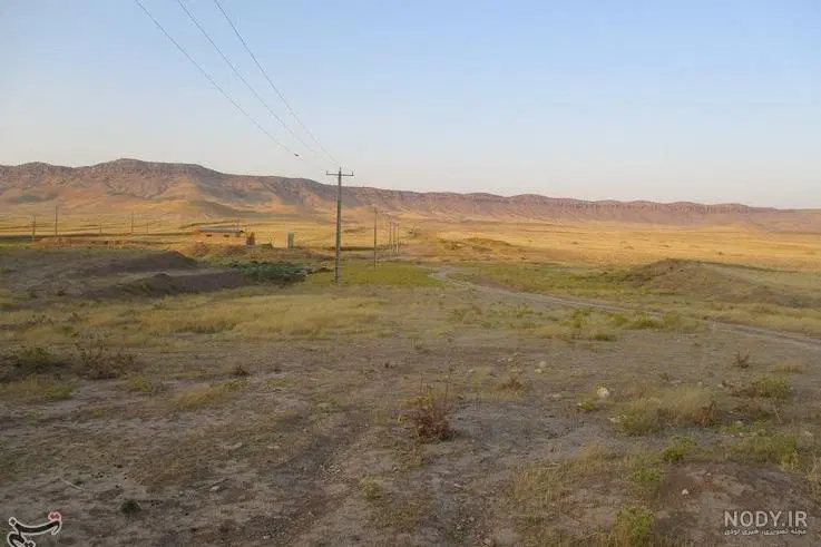 زمین باغی بهر جاده ملایر روستای حاجی اباد