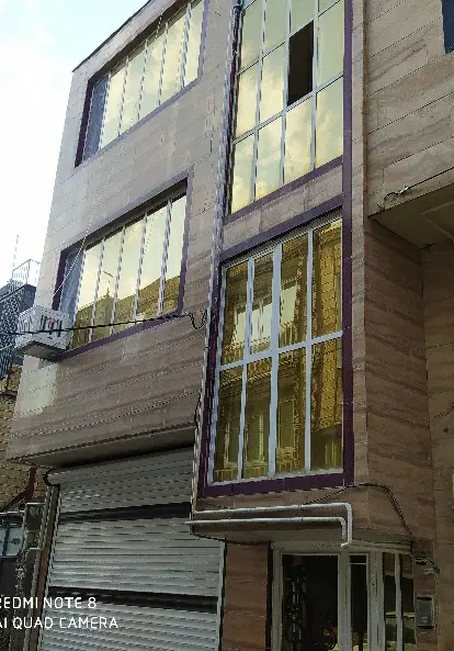 دوشان دو طبقه مسکونی و یک واحد تجاری