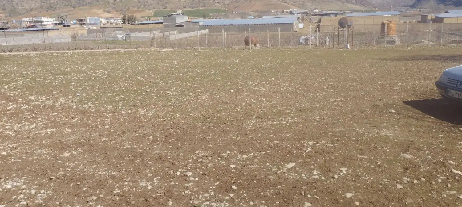 زمین واقع در روستای قلعه سنگی