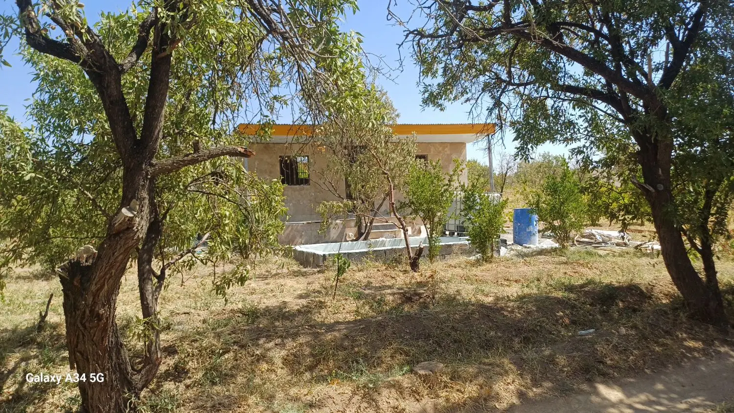 باغ ۱۰۰۰ متری با خانه در روستای صفی آباد