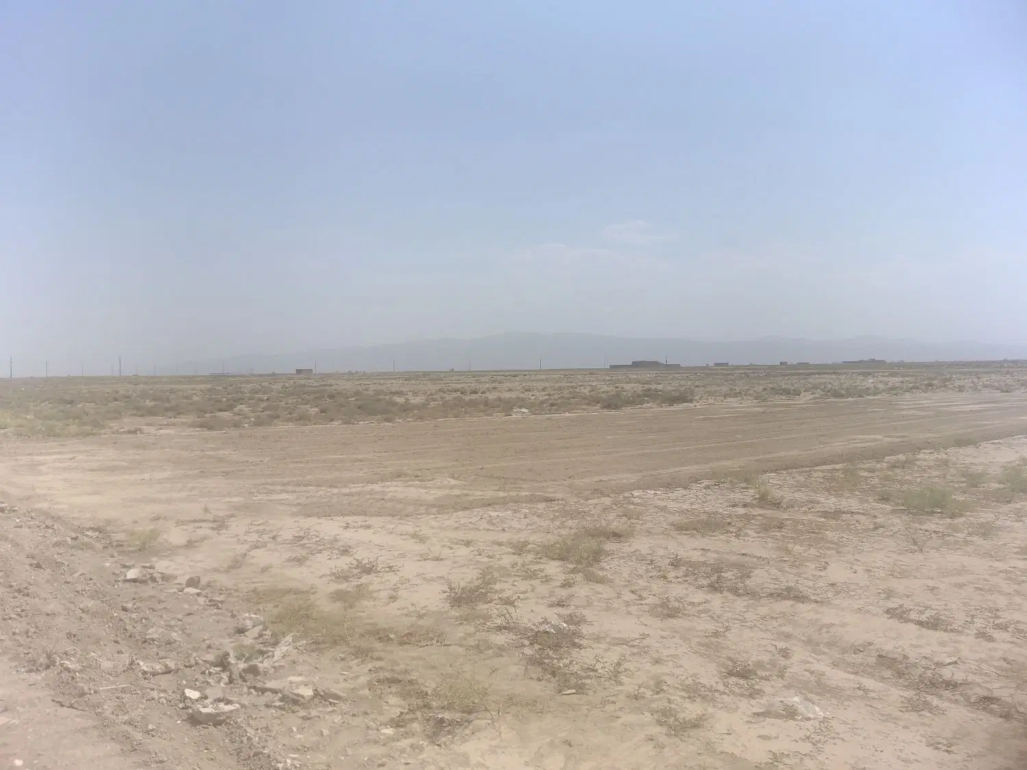 فروش زمین چسبیده به ساوه دو بهر در جاده الوسجرد