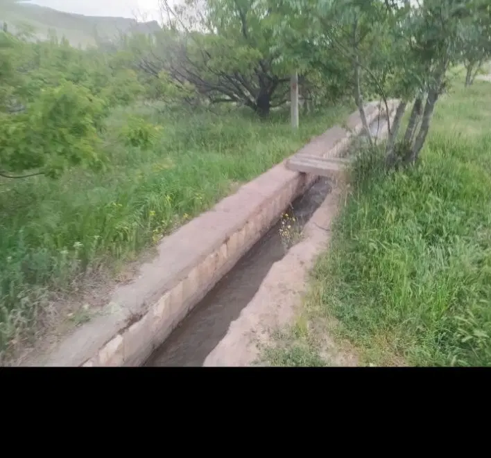 باغ ب متراژ ۱۴۰۰  جاده صحنه کنگاور روبرو کلیدر