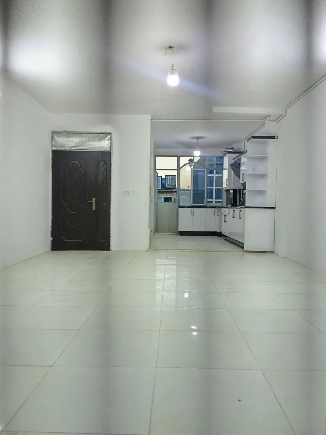 اپارتمان ۱۰۰ متری یک خوابه پارکینگ اختصاصی