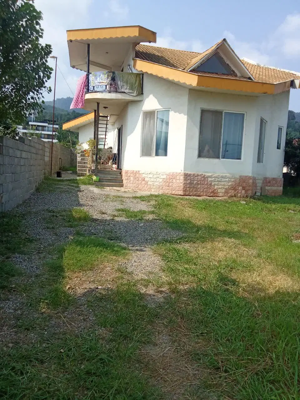 زمین در شمال کشور به متراژ  ۴۴۰ متر ودوطبقه خانه