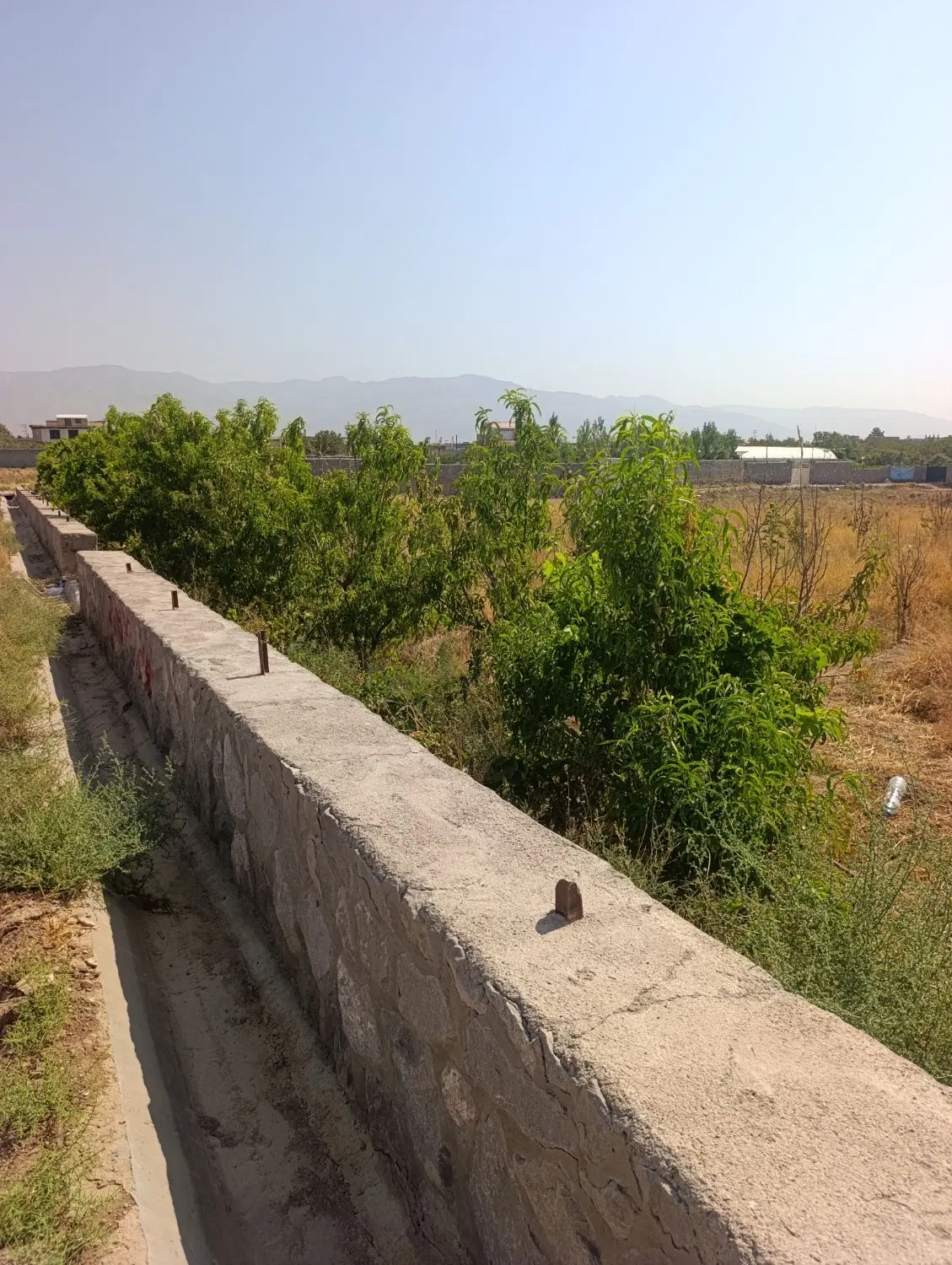 باغ با یک ساعت اب ملکی فروشی