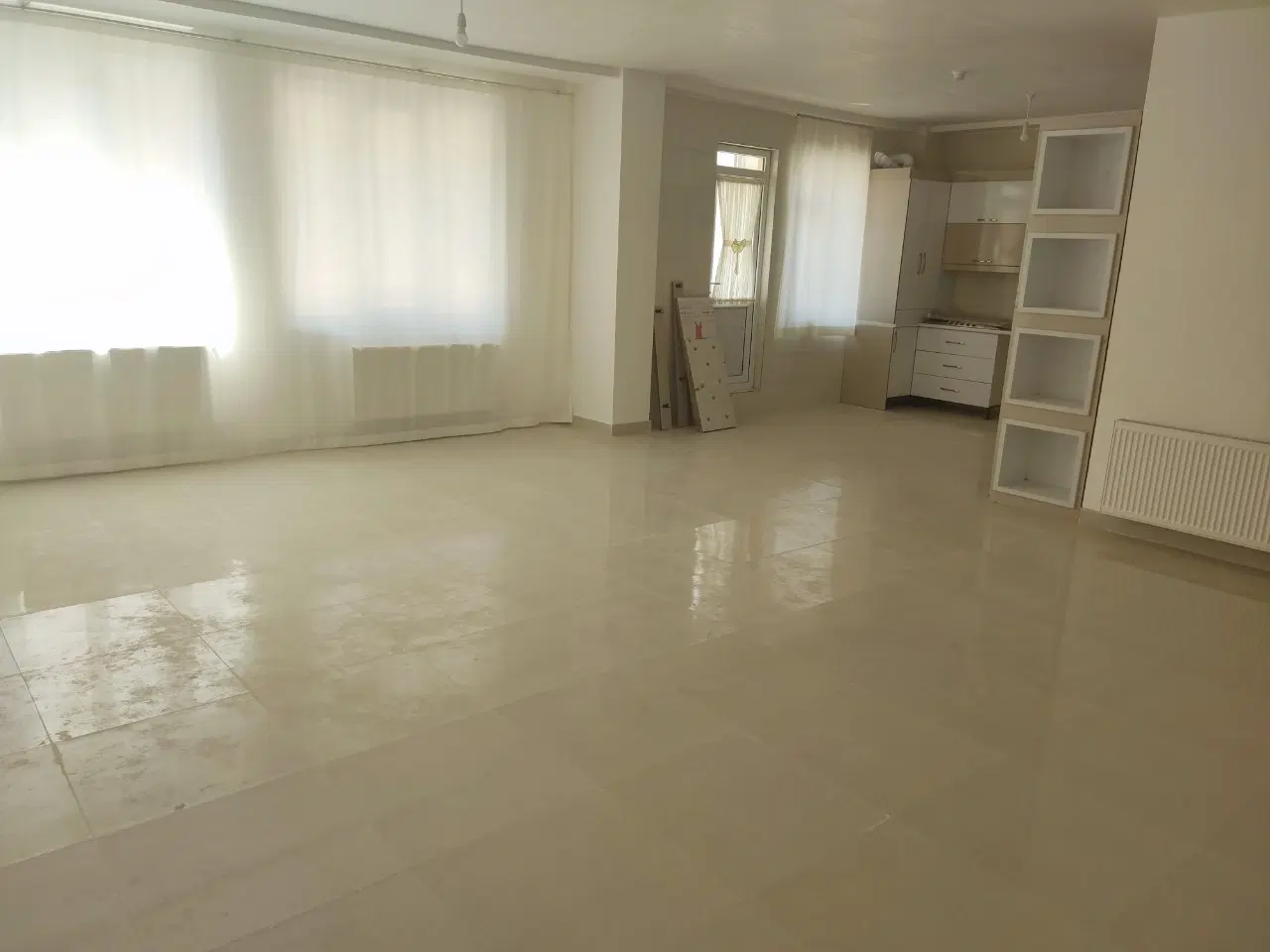 رهن کامل آپارتمان ۱۰۷متری دوخوابه درشهرک کارشناسان