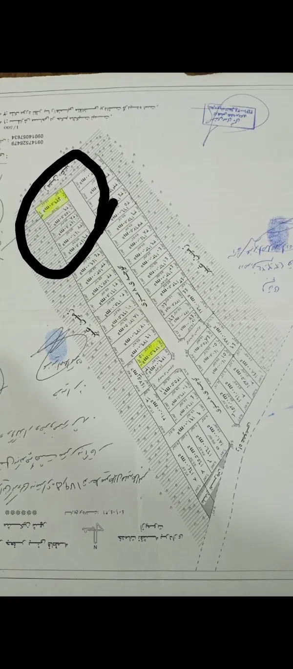 زمین کنار مسکن ملی