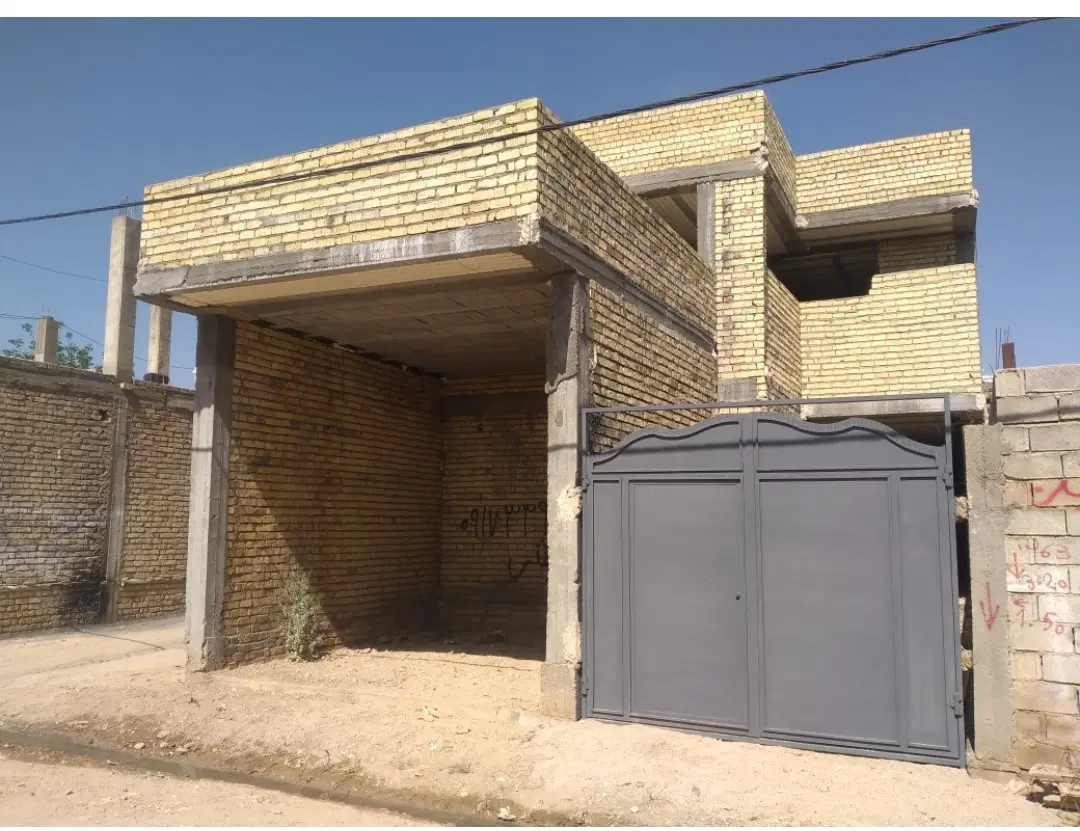 ساختمان دو طبقه و مقازه تجاری