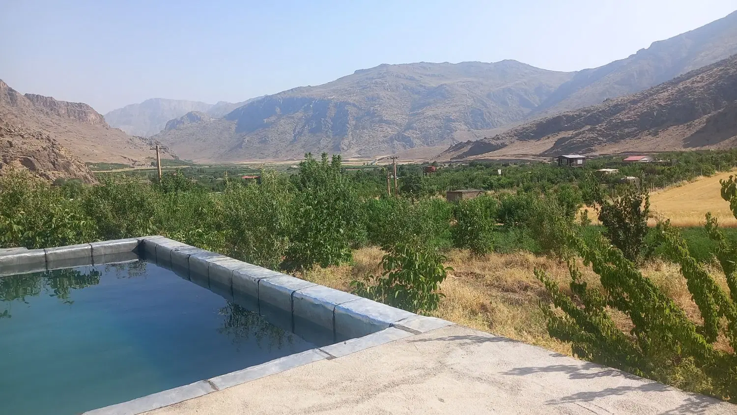 باغ وزمین با امکانات اب وبرق وچاه عمیق