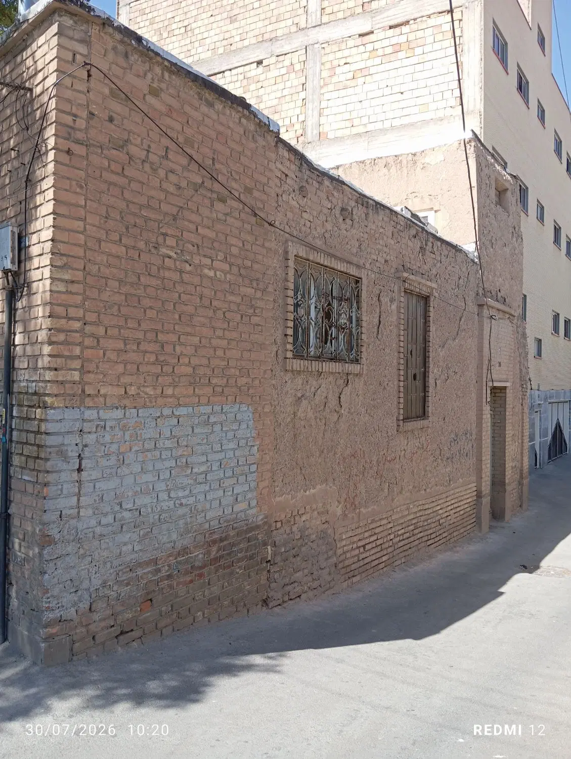 فروش حیاط برخیابان دونبش جنوبی برملل متحد_ملک نیلی